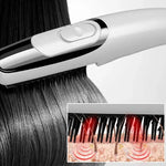 Cepillo Anticaída con luz infrarroja y vibración CleraLux™